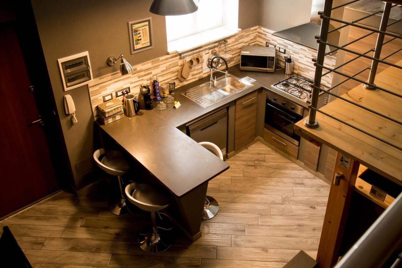 "Here" Mini Loft Alghero Bagian luar foto