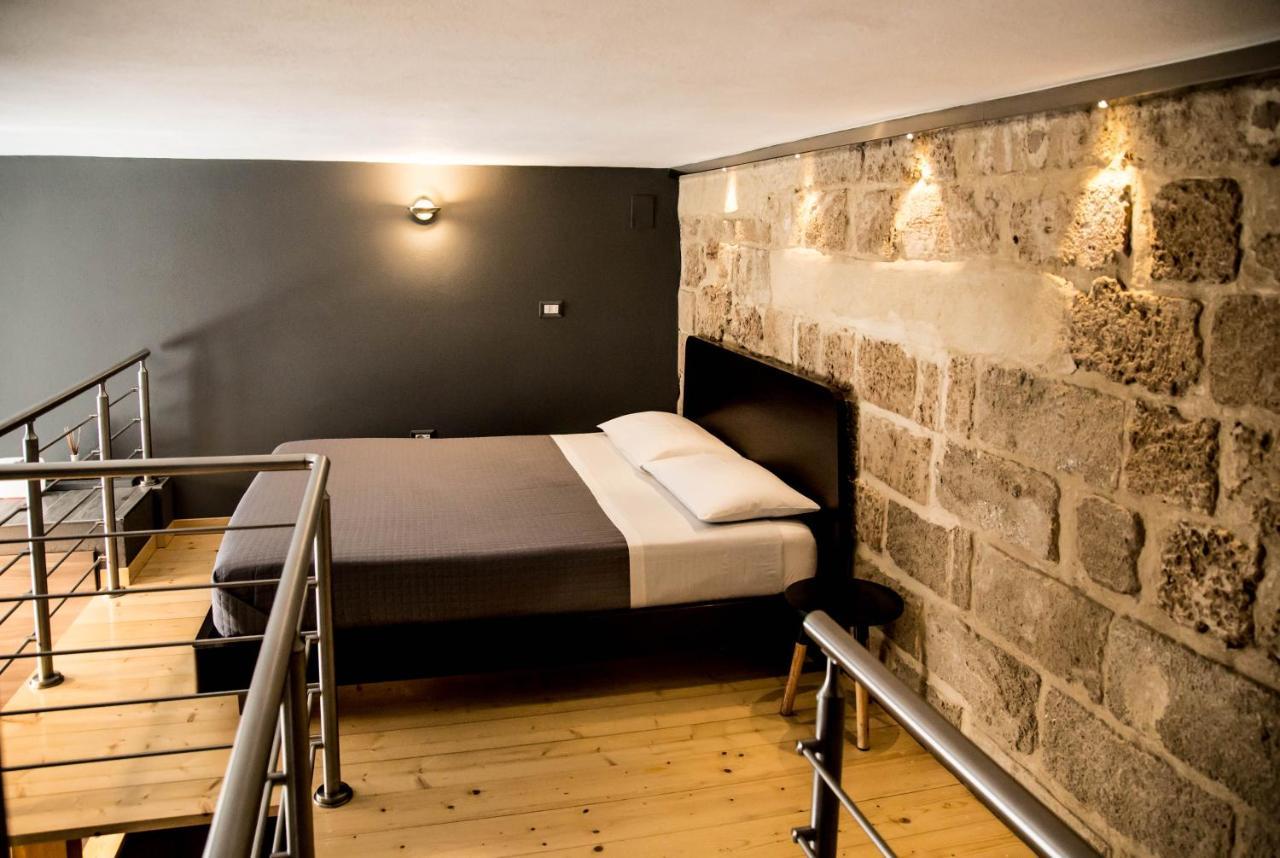 "Here" Mini Loft Alghero Bagian luar foto