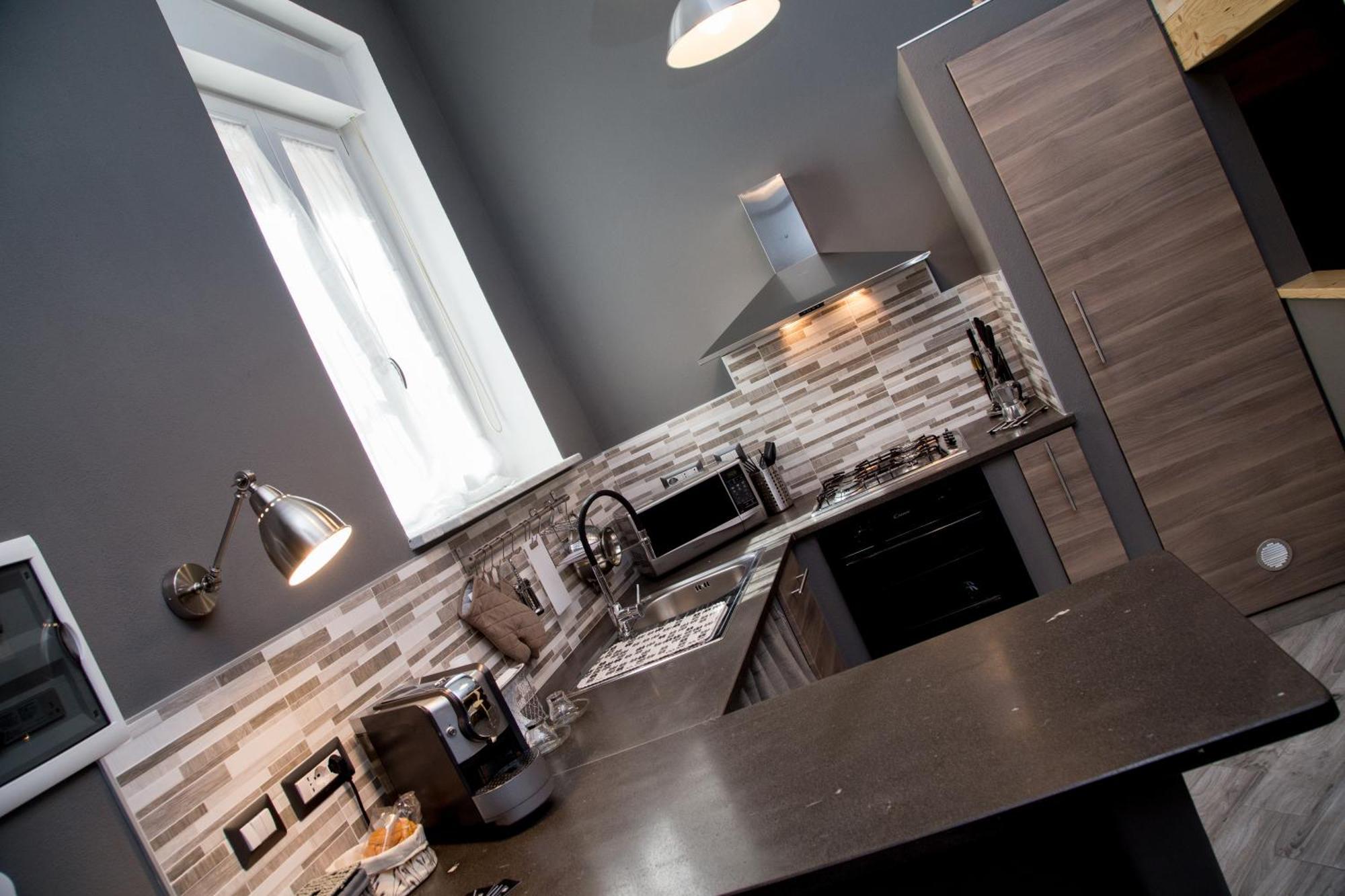 "Here" Mini Loft Alghero Bagian luar foto